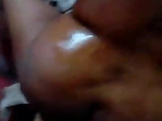 Giving oil massage to indian mom